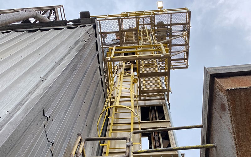 FEECO Bucket Elevator with Service Platform and Ladder Cage