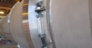 Rotary drum tire reshimming, remounting, and replacement